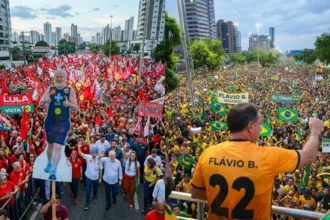 Apoiadores de Lula e Flávio Bolsonaro tomam as ruas na véspera da votação